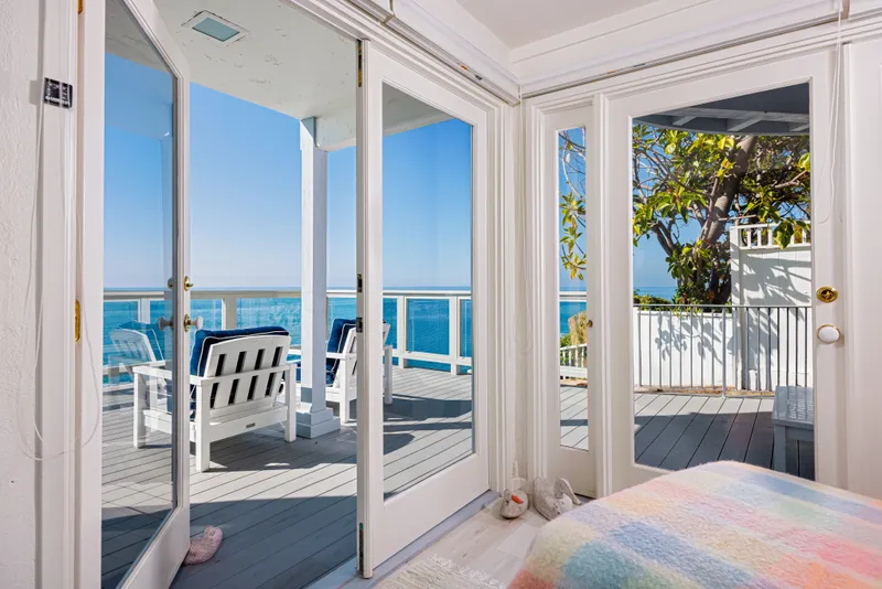 Bedroom with private deck access — Laguna Beach real estate photography