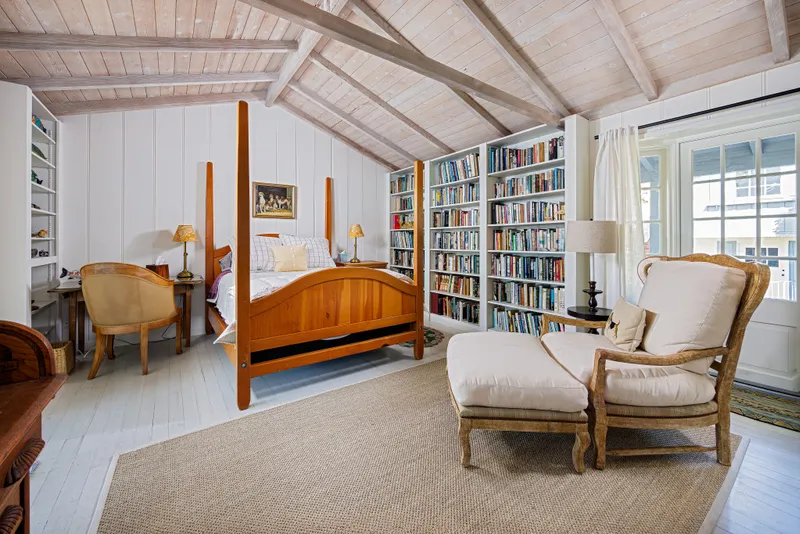 Bedroom with built-in library shelving — Laguna Beach real estate photography
