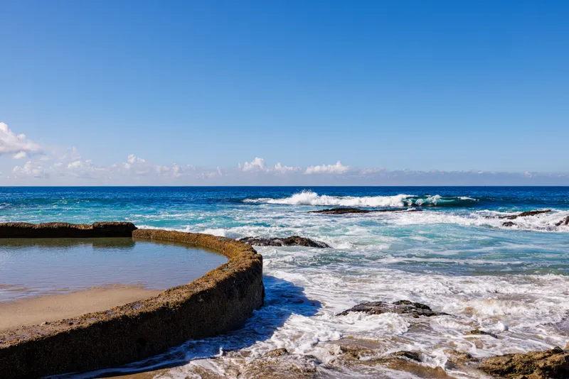 Waves breaking over the Mermaid Pool — Laguna Beach real estate photography