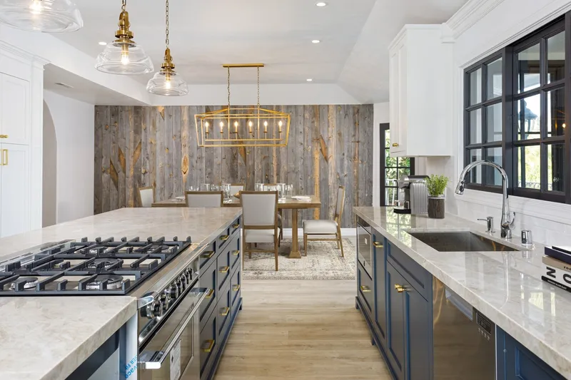 Kitchen virtually staged with stainless appliances and breakfast bar — Orange County, CA real estate photography